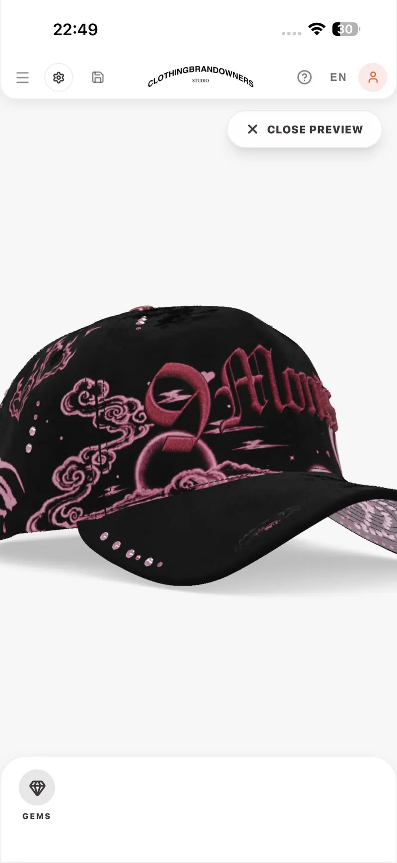 Black cap with pink embroidery previewed in the CBOs studio on an iPhone